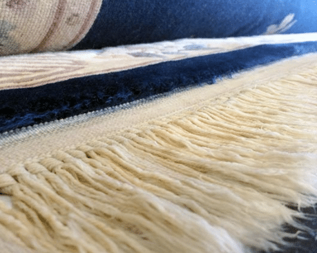 Lavage de tapis avec frange